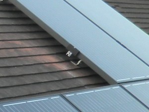 On-roof: plain tiles, showing rails and panels fitted