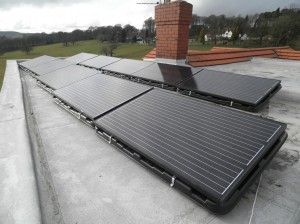 10 x Suntellite solar panels on flat roof