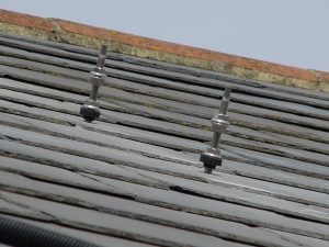 Hanger bolts drilled into a slate roof (Image found on Google - it's not ours!)